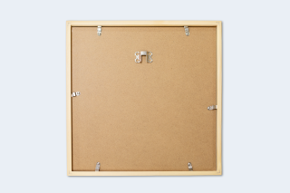 Une fixation simple pour un cadre photo prêt à accrocher