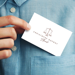 Carte de visite avocat blanche, balance de la justice centrée, texte Christophe Dupont manuscrit